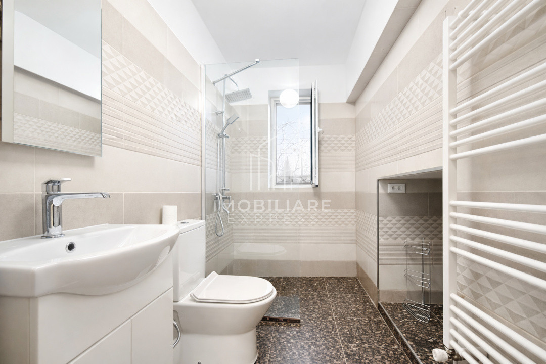 Casă renovată , cu 6 încăperi și 15 locuri de parcare 