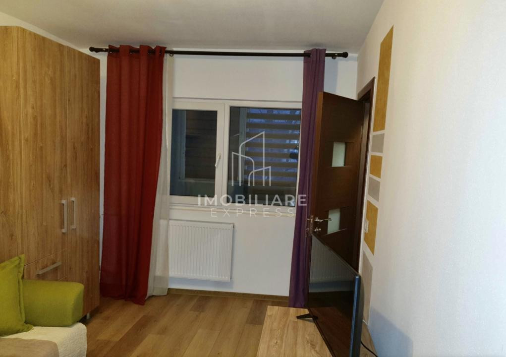 Garsonieră renovată, parter cu balcon