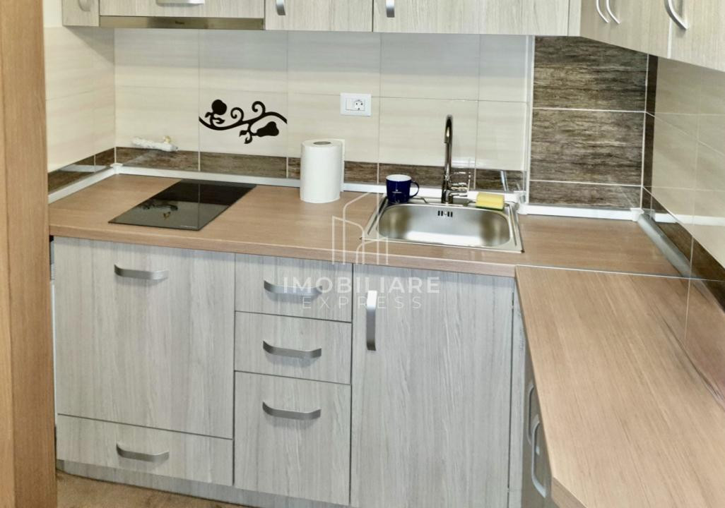 Garsonieră renovată, parter cu balcon