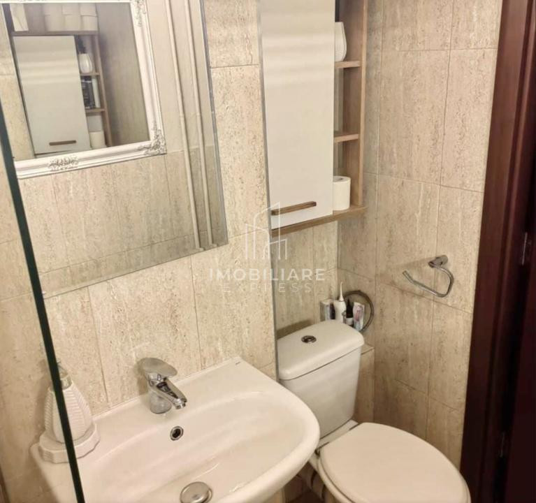 Garsonieră renovată, parter cu balcon
